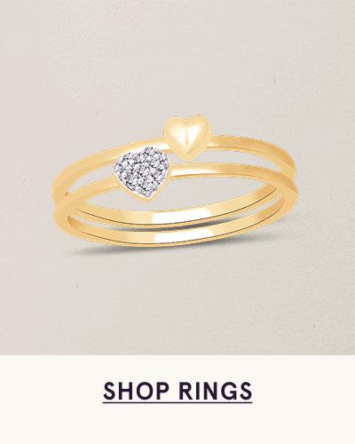 Stacked gold ring double-band design with two small hearts: smooth gold & pavé-set with diamonds. Click here to shop rings