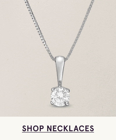 Classic silver pendant necklace with round diamond solitaire. Click here to shop necklaces