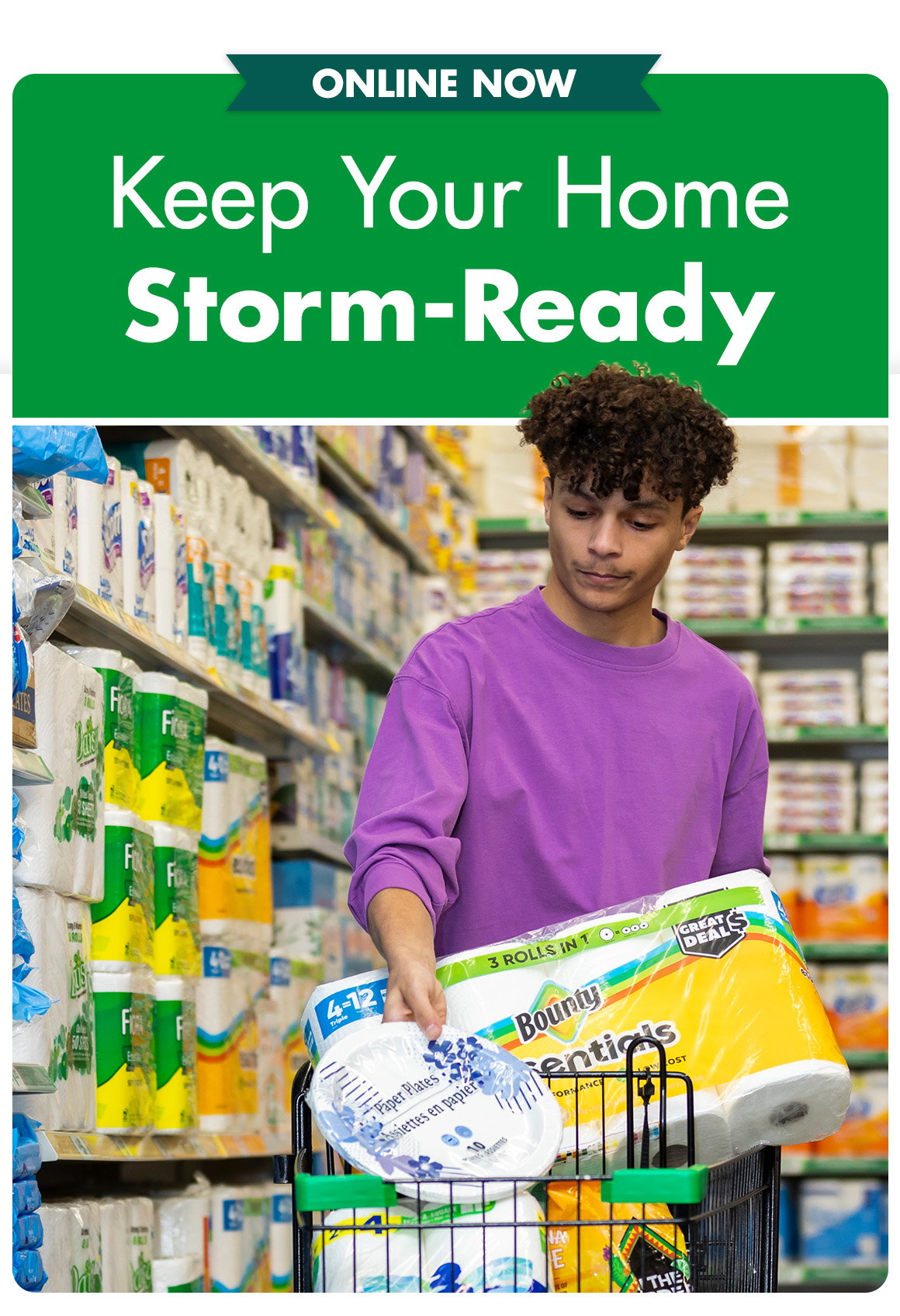 Keep your home storm-ready. Image of a young man adding paper towels and paper plates to a shopping cart in Dollar Tree.