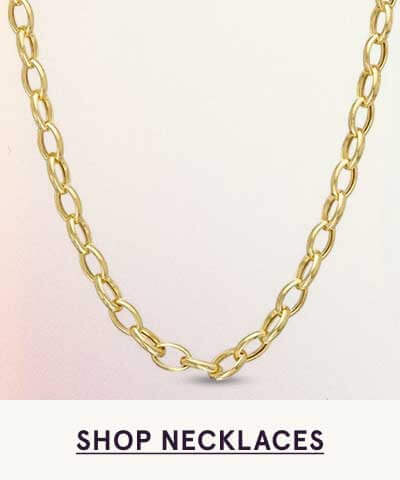 Gold link chain with elongated oval links. Click here to shop necklaces