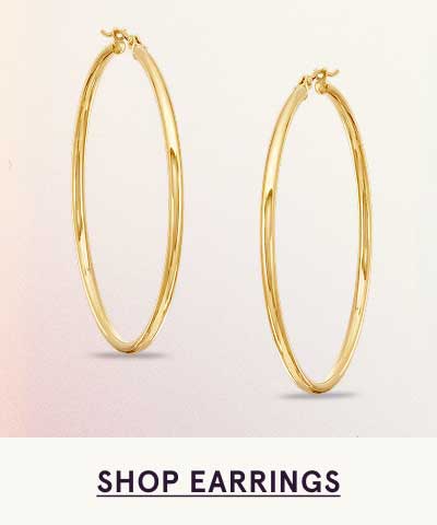 Dainty & thin large gold hoops.  Click here to shop earrings