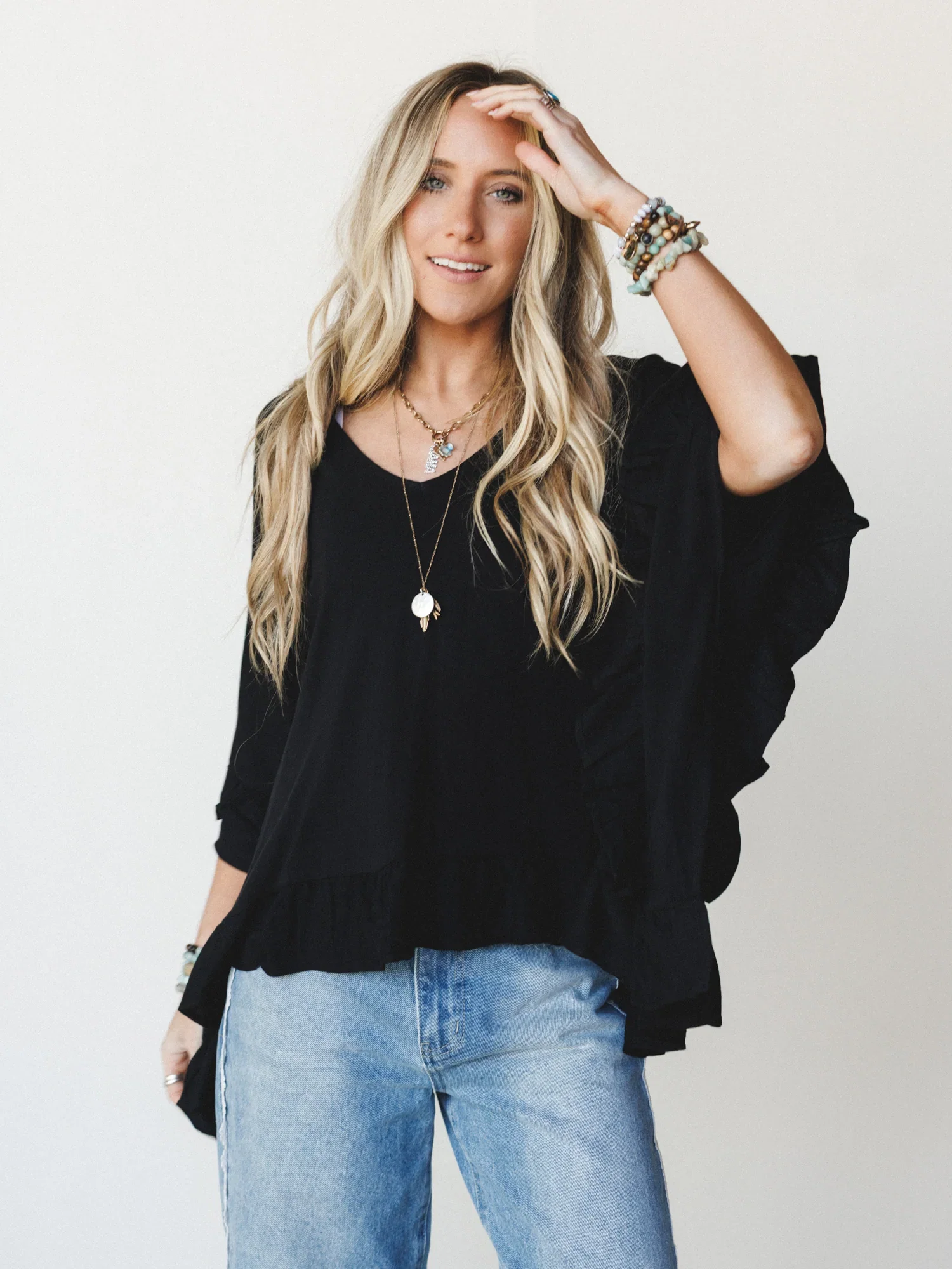 Image of The Nest Let Me Ruffled Poncho Top - Black