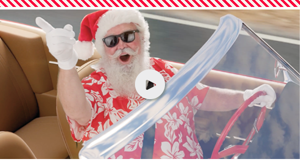 Still image from video of Santa in car.
