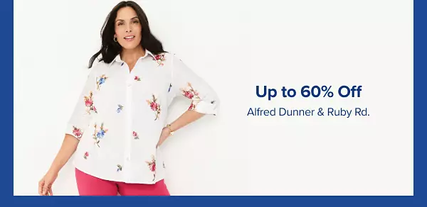A woman in a white button up and red pants. Up to 60% off Alfred Dunner and Ruby Rd.