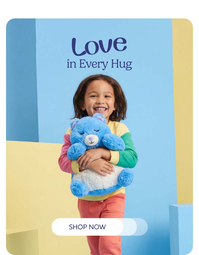 A little kid hugging Bearly Awake Warmies. Shop Now.