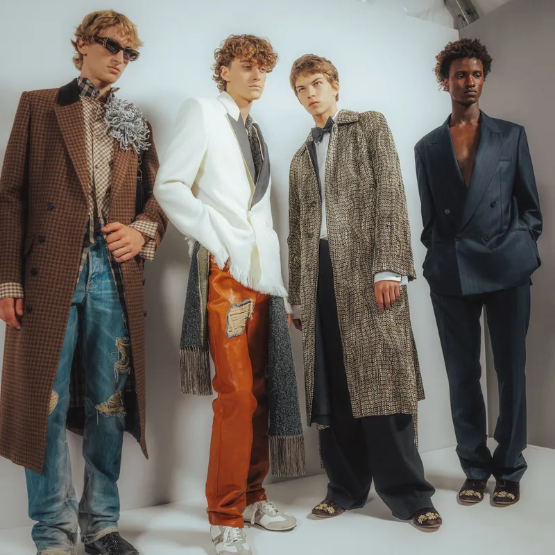 Image may contain: Shane Dawson, Cody Saintgnue, Clothing, Coat, Groupshot, Person, Jacket, Adult, Overcoat, and Pants