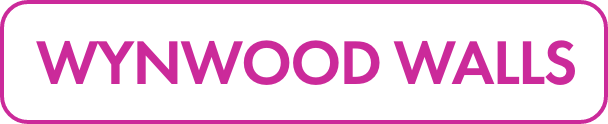 The image features the words "WYNWOOD WALLS" in bold magenta capital letters. The text is centered inside a rounded rectangular white sign with a magenta border. The design is clean and minimal, emphasizing the vibrant color contrast. The overall look is modern and graphic, suitable for urban art or district signage themes.