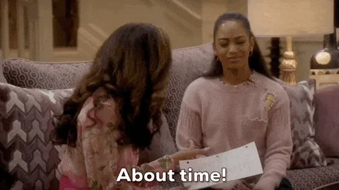 A woman saying, "About damn time."