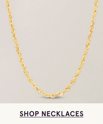 Twisted yellow gold rope chain necklace. Click here to shop necklaces
