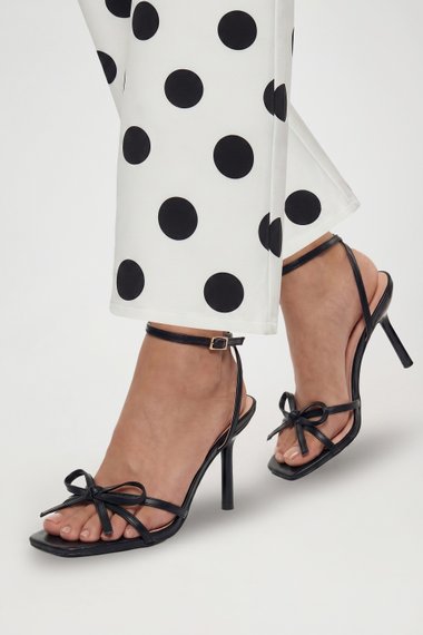 Black Faux Leather Barely There Bow Medium Stiletto Heel Sandals