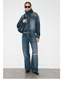 Man wearing denim jacket and distressed jeans outfit