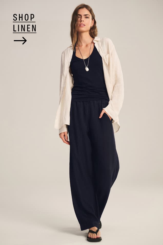 Image shows a model wearing the Mulholland Top in Chalk with the Lola Pant in Shadow.