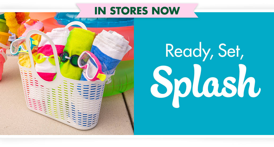 Ready, Set, Splash. Swim goggles and beach towels in a plastic tote, poolside.