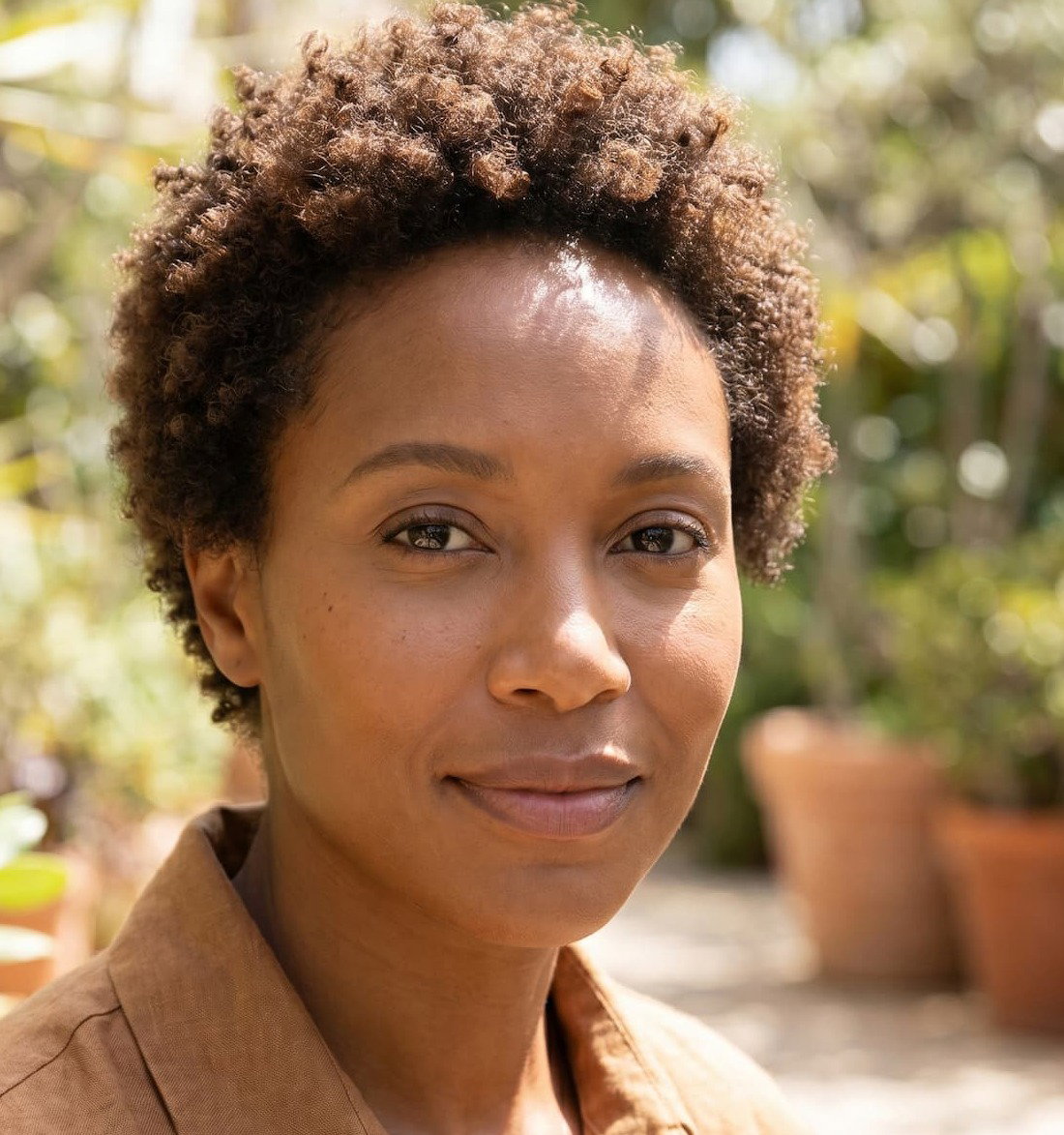 Black woman outside with natural hair