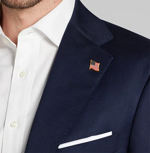 Featuring textured wool blend with stretch, a softer shoulder, and lightweight construction. Signature details like antique brass eagle crest buttons and bespoke interior labeling bring craftmanship to every wear. | Shop Now