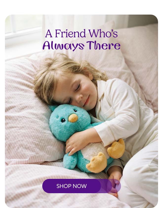 A little girl hugging Avina Warmies. Shop Now.