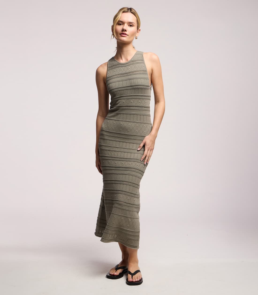Image shows a model wearing the Ylena Dress in Olive.