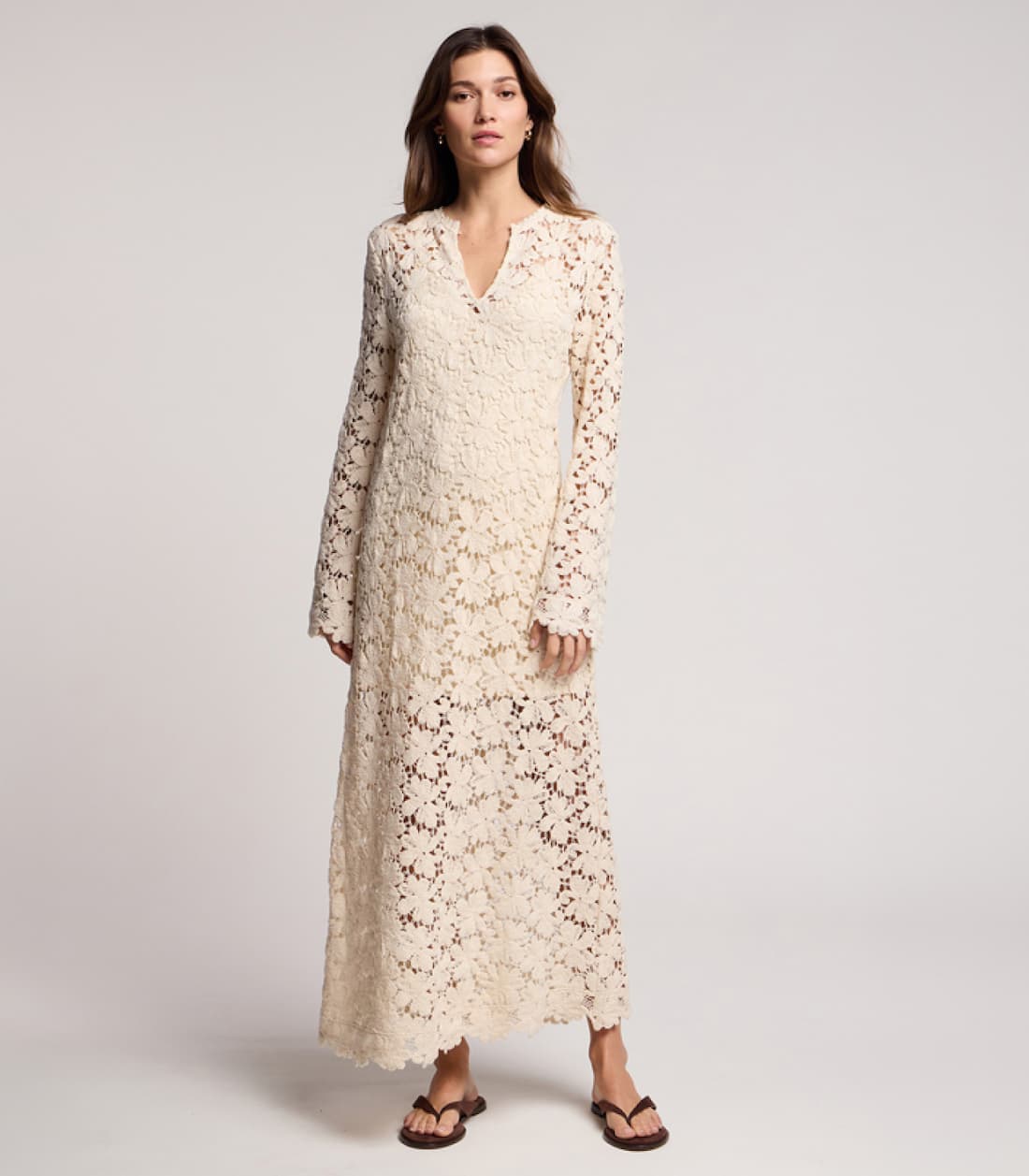 Image shows a model wearing the Jovie Dress in Oat.