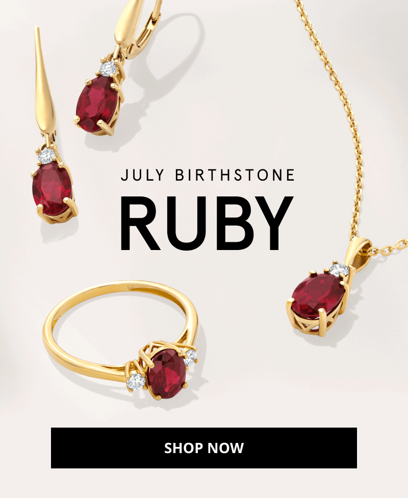 A set of yellow gold and ruby jewelry. A set of earrings, necklace and ring all with a ruby pendant and accent diamonds. July Birthstone Ruby. Click Shop Now. 