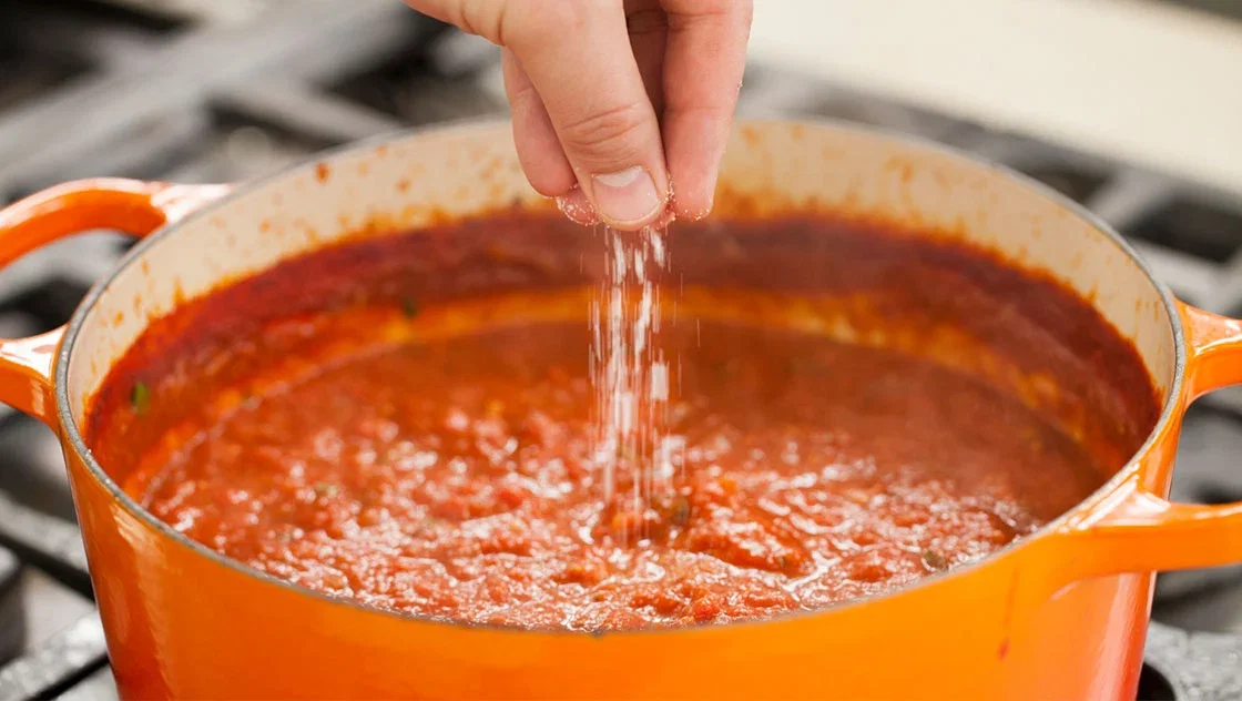 Adding salt to a marinara sauce