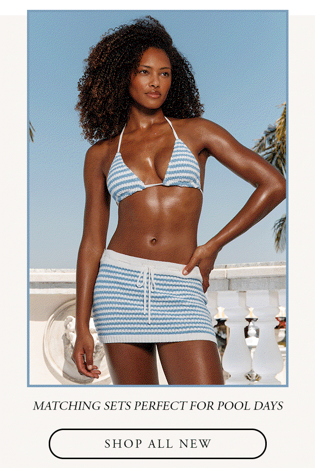GIF of models wearing the London blue and white knit bikini with the matching cover up skirt. Shop all new. 