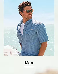 A man in a blue shirt. Men.