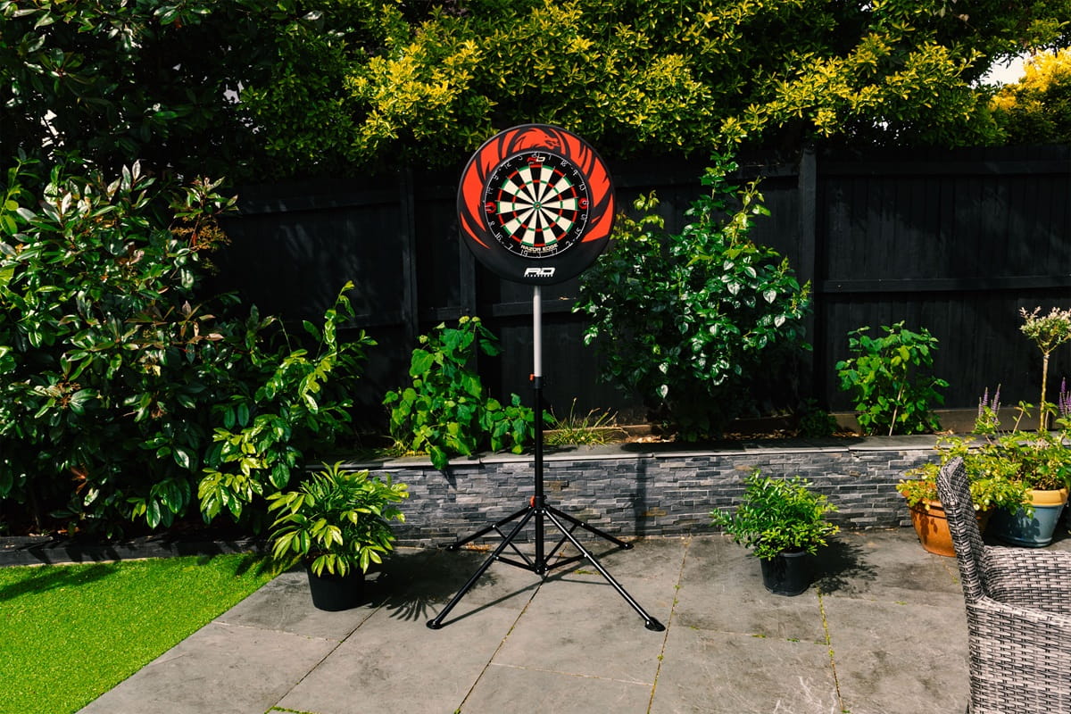 Red Dragon Xtreme dartboard stand with Blade 6 board and surround set up on a garden patio