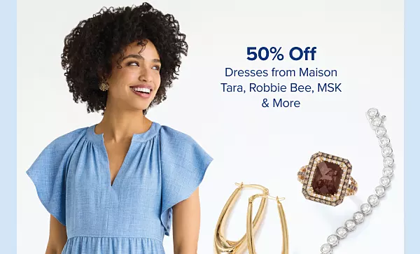 A woman in a blue dress. 50% off dresses from Maison Tara, Robbie Bee, MSK and more.