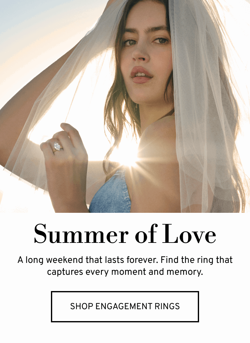 Model in sunlight wearing veil and ring. Find the ring that captures every moment and memory. Click to Shop Engagement Rings