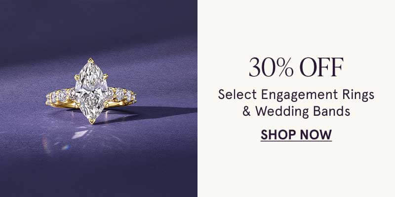 Marquise-cut center stone ring. 30% OFF Select Engagement Rings & Wedding Bands. Click here to shop now