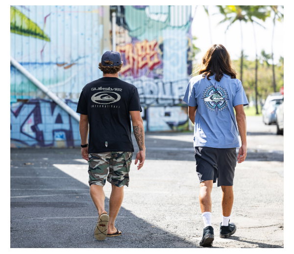 Quiksilver graphic tees styled with boardshorts for summer beach days