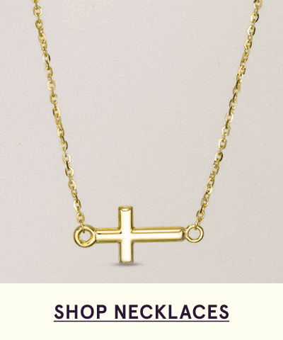 Delicate yellow gold link necklace with side-ways cross pendant. Click here to shop necklaces