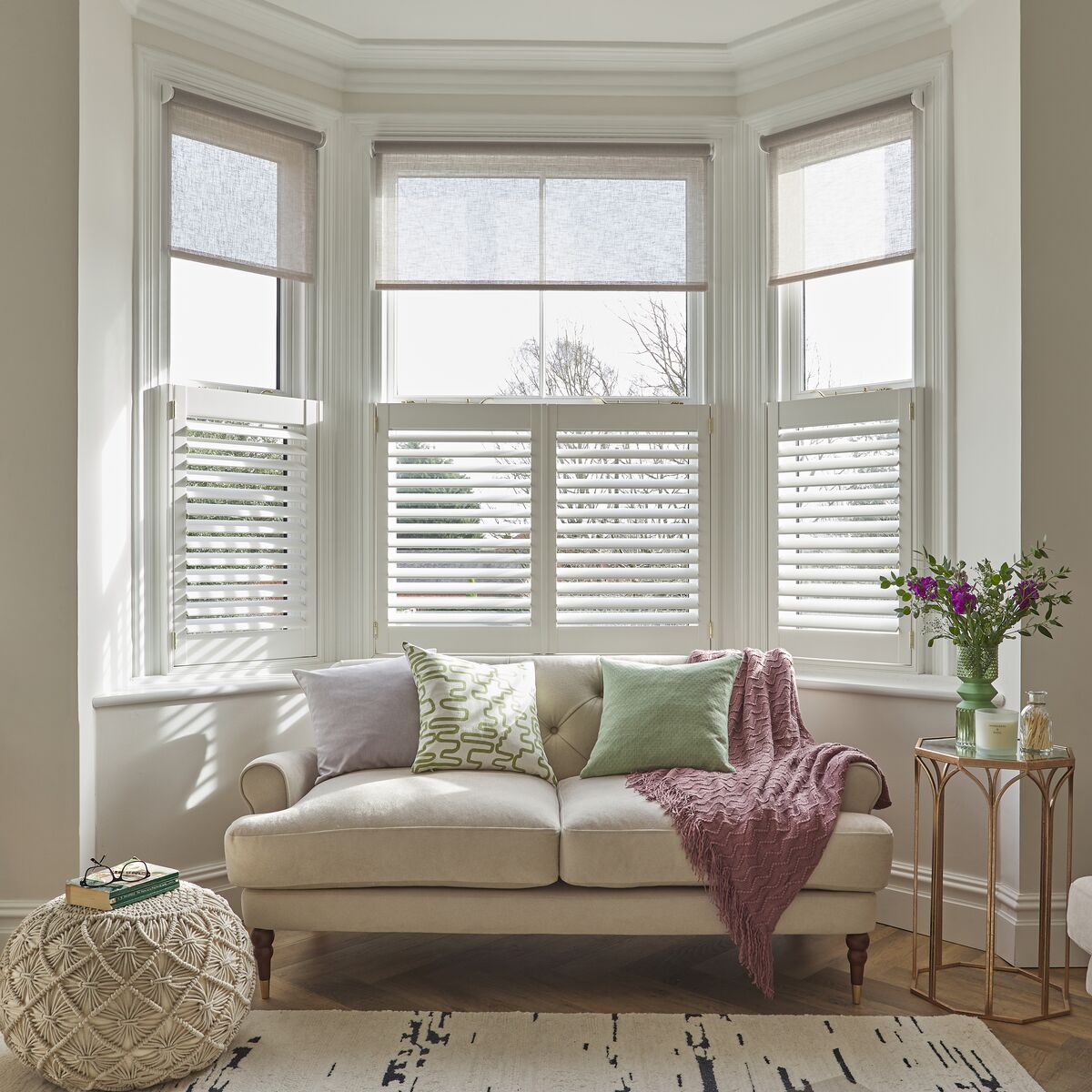 Café style shutters covering the lower half of a window