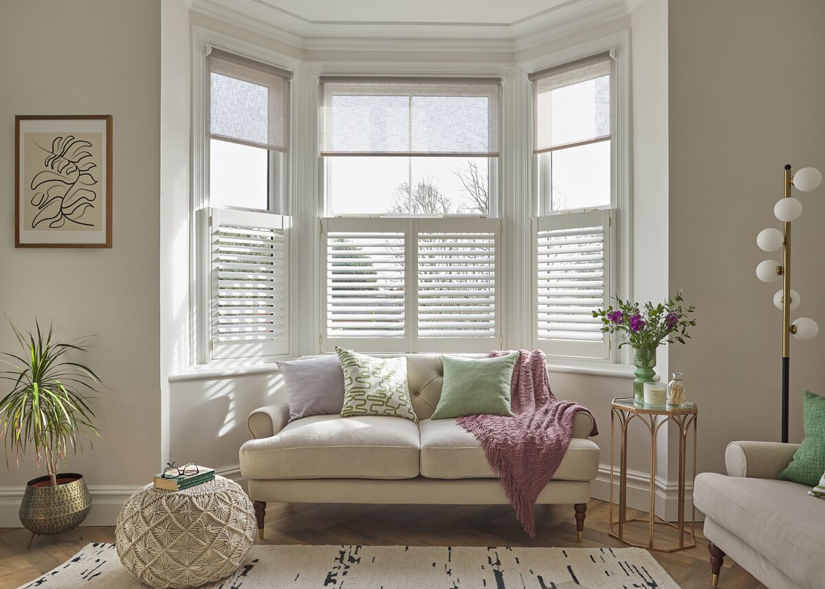 Café style shutters covering the lower half of a window