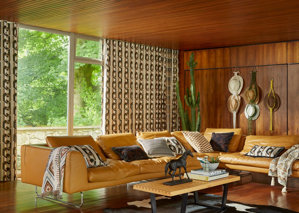 Floor-to-length curtains framing a large window