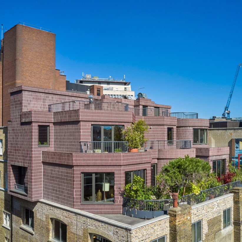 David Kohn Architects designs London penthouse to resemble "house on a hill"