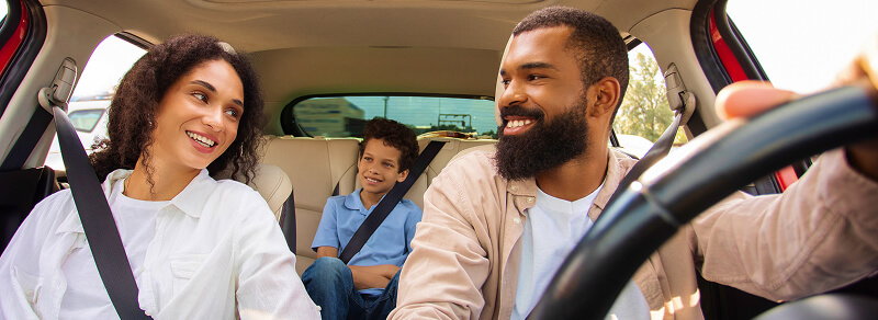 Family traveling in a car