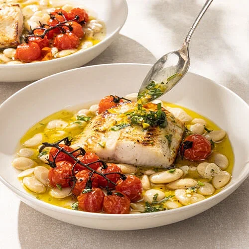 Black Cod with Charred Tomatoes, Stewy Beans, and Tarragon-Pistachio Pesto