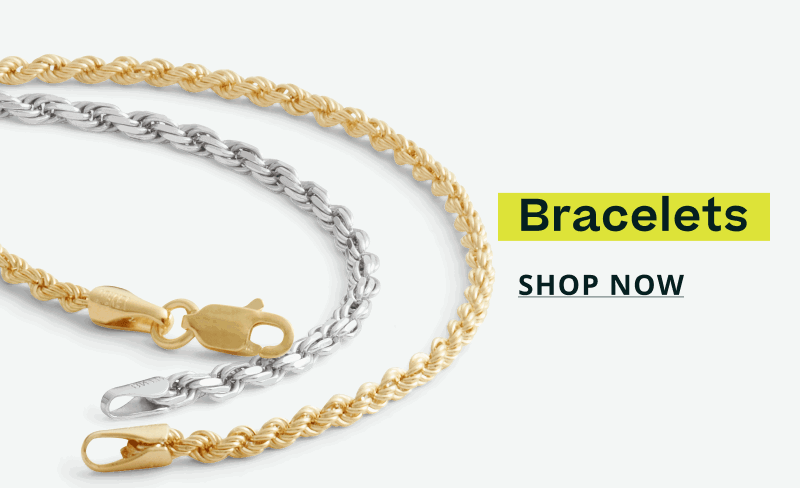 Layered duo of twisted rope bracelets in gold & silver. Bracelets. Click here to shop now