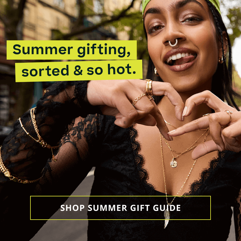 Model with gold chains, hoops & pendants. Summer gifting, sorted. Click here to shop summer gift guide