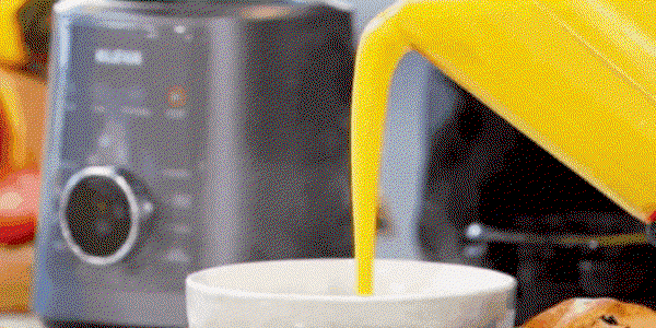hot soup pouring into bowl