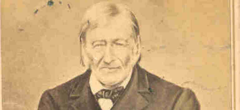 Old black and white photograph of an elderly man with sideburns and a somber expression, wearing a dark suit and bow tie, against a plain background.
