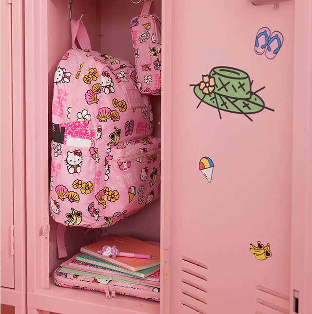 BACK TO SCHOOL READY | ALOHA COLLECTION | Pink backpack, lunchbag, pencil pouch and laptop case displayed in a pink locker with cute graphic icons.