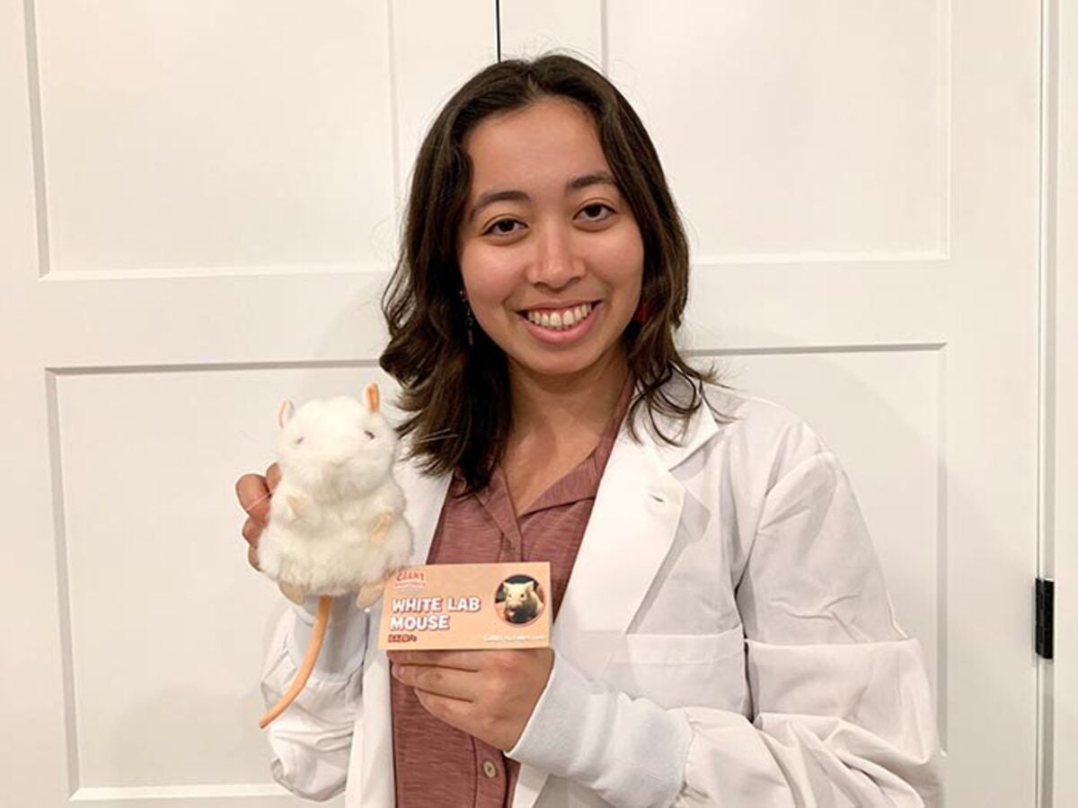 White Lab Mouse with scientist