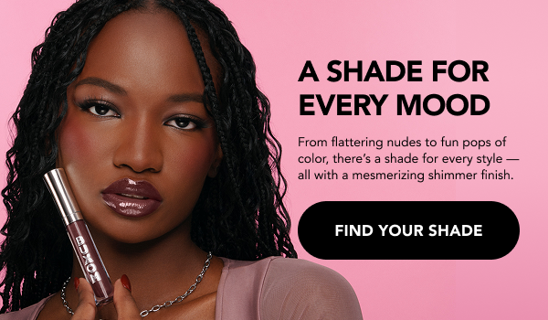 Model holding Full-On™ Plumping Lip Polish Gloss