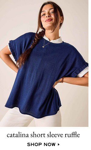 Catalina short sleeve ruffle - shop now - image of a woman wearing a blue short sleeve sweater with ruffle detail 