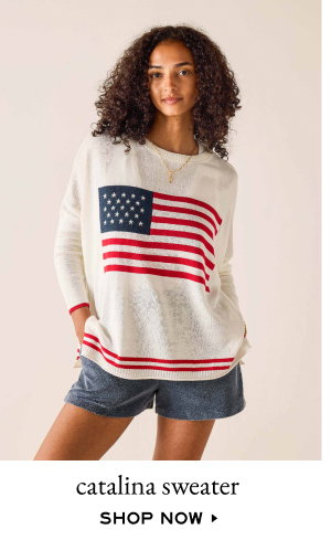Catalina sweater - shop now - image of a woman wearing a red and white striped sweater