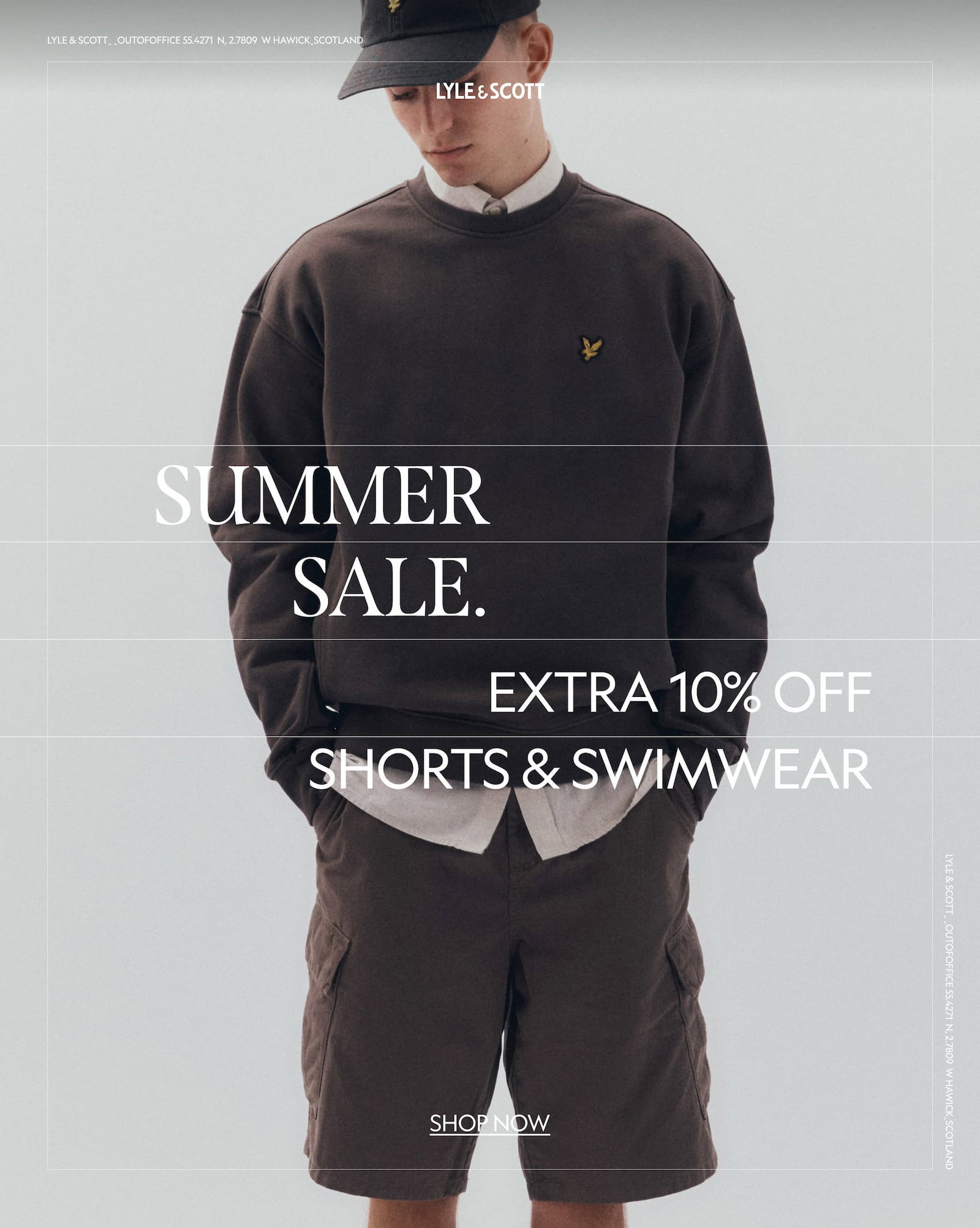 Model wearing shorts and sweatshirt