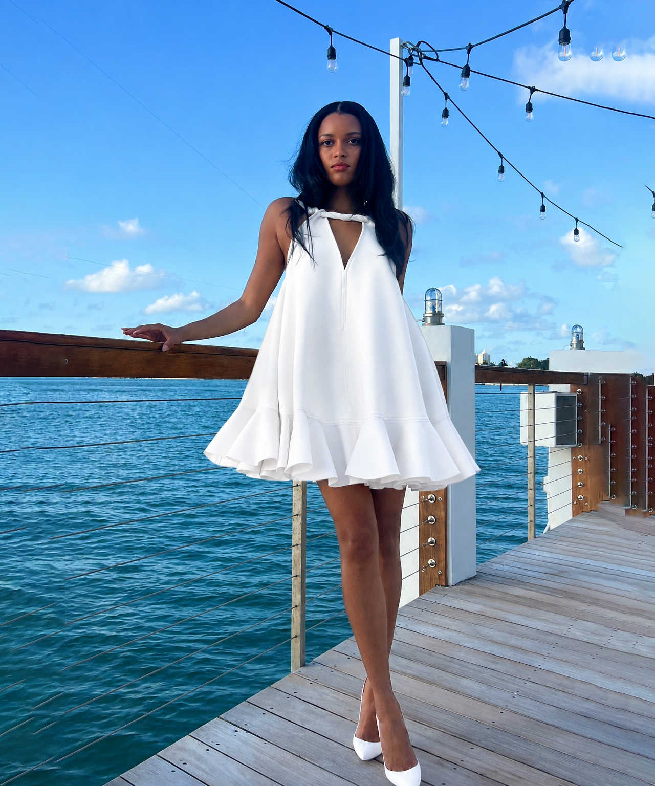 larissa muehleder in the ava dress on a boardwalk