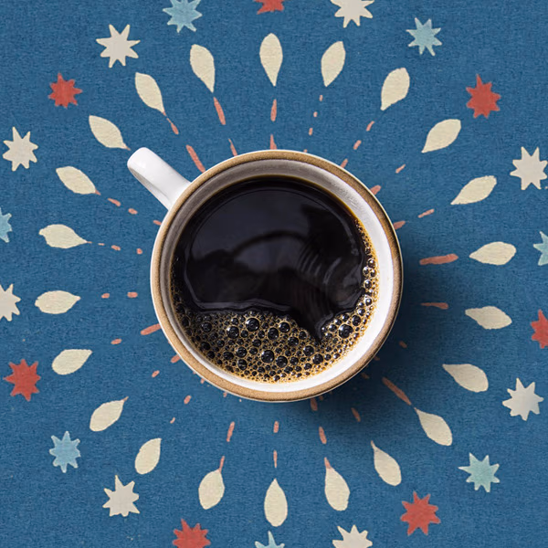 Mug of Peet's coffee surrounded by illustration of sparklers